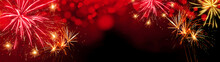 Abstract Festive Silvester New Year 2024 Party, New Year's Eve Celebration  Background Panorama Banner Long - Red Golden Firework On Red Texture With Bokeh Lights And Space For Text