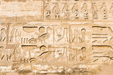 Fototapeta Miasto - It's Hieroglyphs of the Medinet Habu (Mortuary Temple of Ramesses III), West Bank of Luxor in Egypt.