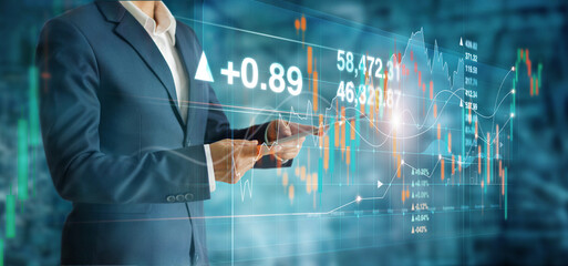 Poster - Businessman using tablet and analyzing sales data economic growth graph on modern virtual interface, Business strategy and planning, stock market and exchange on network.
