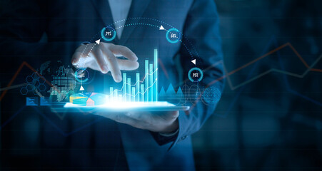 Aufkleber - Businessman using tablet analyzing sales data and economic growth graph chart on virtual interface. Business strategy. Abstract icon. Digital marketing.