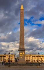 The largest square of Paris, Place de la Concorde with the Egyptian Obelisk of Luxor and Arc du Triomphe in the Champs Elysees in the background in Paris, France 