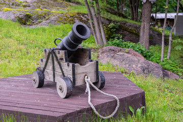 Ancient weapon. A gun. Old weapons in the Park.