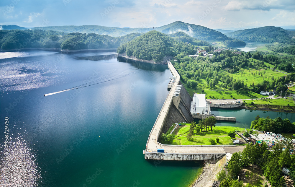 The Solina Dam aerial view, largest dam in Poland located on lake Solina. Hydroelectric power plant in Solina of Lesko County in the Bieszczady Mountains area of south-eastern Poland. - obrazy, fototapety, plakaty 
