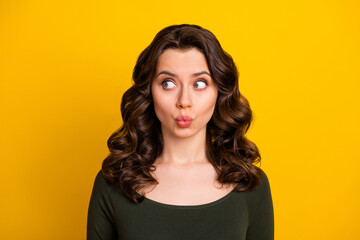 Wall Mural - Close-up portrait of her she nice attractive funny funky positive naughty cheerful cheery wavy-haired girl sending air kiss looking aside isolated on bright vivid shine vibrant yellow color background