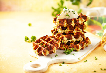 Sticker - Homemade low carb zucchini waffles on white wooden board on yellow background. Concept of keto diet food.