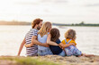 © pikselstock - Young family enjoying time at the beach