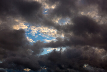 Wall Mural - Nature gray sky background with big clouds.