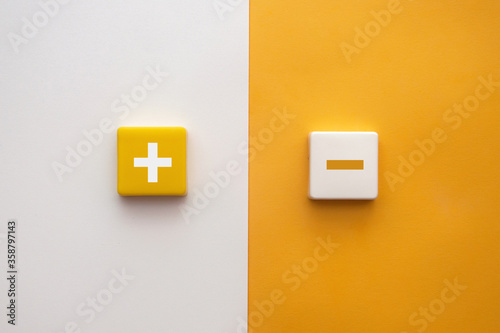 Cuadros en Lienzo Plus and minus signs on a multi-colored background