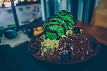 view from above on green tea bingsu decorated with chocolate