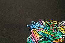 Colorful Paper Clips On Black Background