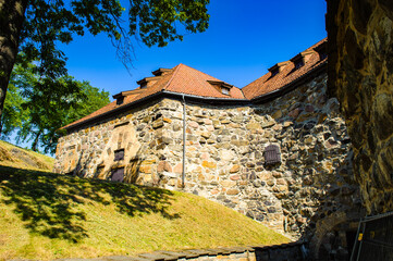 It's Akershus Fortress, a medieval castle that was built to protect Oslo, the capital of Norway. It has also been used as a prison.