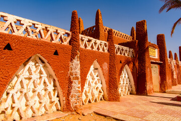 red architecture of timimoun, adrar province, south-central algeria