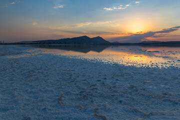 Wall Mural - Salt lake shore at sunset day