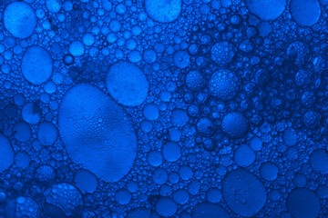 Poster - Close up beautiful abstract blue bubbles in water extreme. Abstract nature pattrn for design.