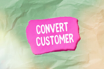 Poster - Word writing text Convert Customer. Business photo showcasing marketing tactics and strategy turning leads into buyer Green crumpled ripped colored paper sheet centre torn colorful background