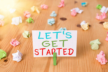 Wall Mural - conceptual hand writing showing lets get started. concept meaning encouraging someone to commence or