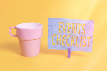 Fototapete - Handwriting text Events Checklist. Conceptual photo invaluable tool for successfully managing your affair Cup empty paper blue clothespin rectangle shaped reminder yellow office
