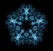 Snowflake pattern isolated on black background. X ray effect.