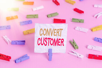 Poster - Writing note showing Convert Customer. Business concept for marketing tactics and strategy turning leads into buyer Colored clothespin papers empty reminder pink floor office pin