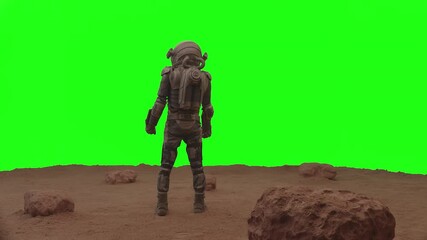 Wall Mural - green screen chroma key back view of astronaut walking on a surface of a red planet, cheking his hud