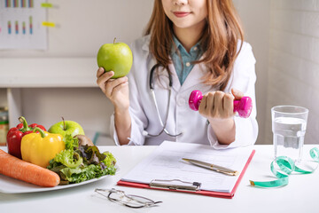 Nutritionist giving consultation to patient with healthy fruit and vegetable, Right nutrition and diet concept