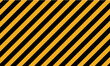 fond ou bannière lignes diagonales noir et jaune représentant un danger ou limite