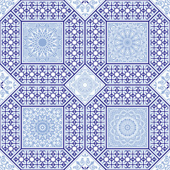  Vintage seamless pattern in Portugal style. Azulejo.Seamless patchwork tile in blue and white colors. Endless pattern can be used for ceramic tile, wallpaper, linoleum, textile, web page background