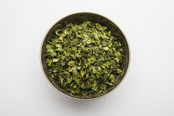 Wall Mural - Kasoori Methi also known as Kasuri Methi or Dried Fenugreek Leaves