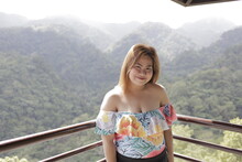 Young Filipina Woman In The Mountains
