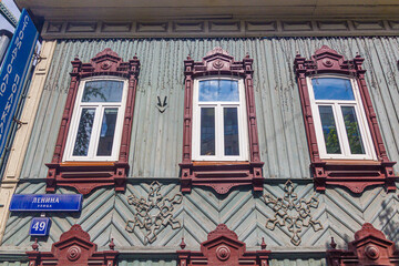 TYUMEN, RUSSIA - JULY 6, 2018: Typical Russian wooden house, Lenin street in Tyumen, Russia