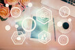 © peshkova - Double exposure of social network theme drawing over table with phone. Top view. People connecting concept.