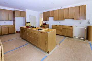 Wall Mural - Wooden installation of in the kitchen of installation cabinets