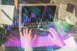 © peshkova - Double exposure of woman hands typing on computer and forex chart hologram drawing. Stock market invest concept.