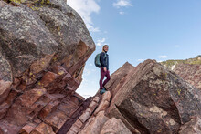 Female Hiker Standing On A Rock Formation, Boulder Flatiron