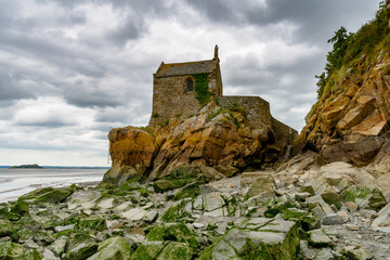 Wall Mural - Fortification of the  Mont Saint-Michel, an island commune in Normandy, France. UNESCO World Heritage