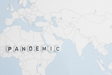  The word pandemic over world map