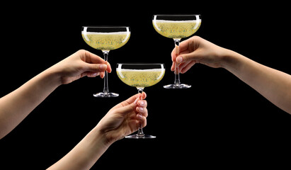 Wall Mural - Set of hands holding glass of sparkling champagne isolated on black.