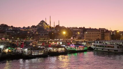 Wall Mural - Istanbul cityscape with Suleymaniye Mosque and tourist boats at night in Turkey