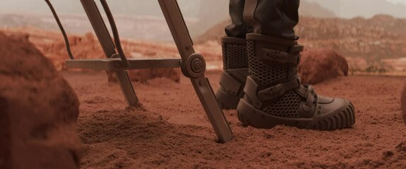 Wall Mural - astronaut getting down to a surface of a red planet from a spaceship, making first steps. mars colon