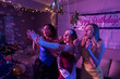 © Mat Hayward - Three girls dancing and singing at a birthday party