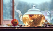 Tea pot with tea leaves.