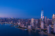 Aerial view of low Manhattan, new york at beautiful cloudy dusk from Hudson river