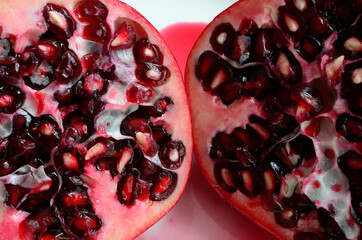 pomegranate apple cut in half closeup