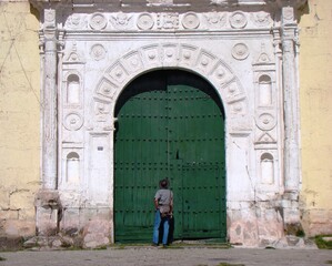 Entrance to the Colonial church Nuestra Señora de la Asuncion (andean baroque) in Chucuito (Lake Titicaca, Peru)				