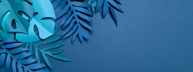 Paper cut fake tropical leaves banner.