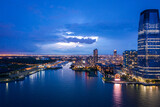 Fototapeta Londyn - Aerial view of Jersey City Skyline with Morris Canal Park at Dusk. 