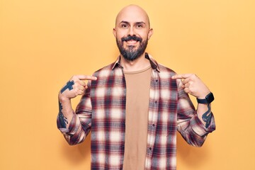 Sticker - Young handsome man wearing casual clothes looking confident with smile on face, pointing oneself with fingers proud and happy.