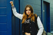 © Raisa Kanareva - stylish hipster girl against colorful wall