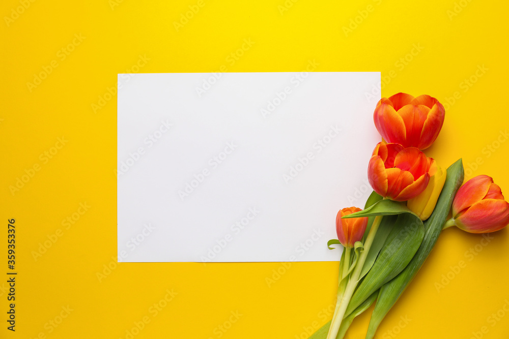 Blank card with flowers on color background