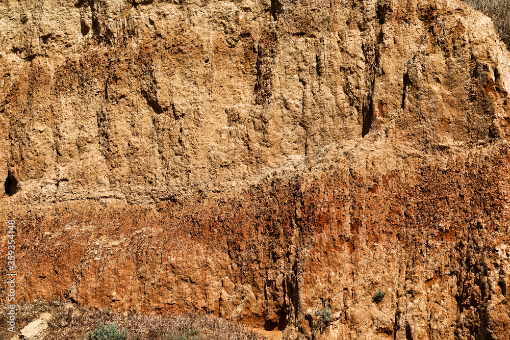 Texture of clay mountain as background